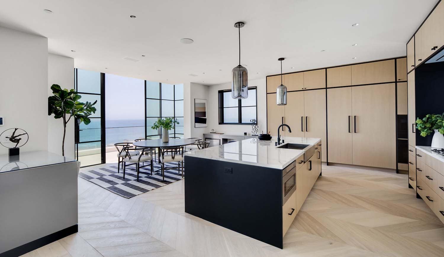 coastal contemporary kitchen looking into the dining room