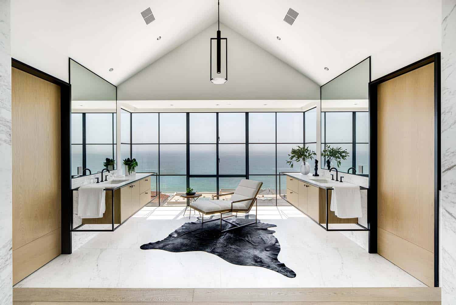 coastal contemporary bathroom with a wall of glass