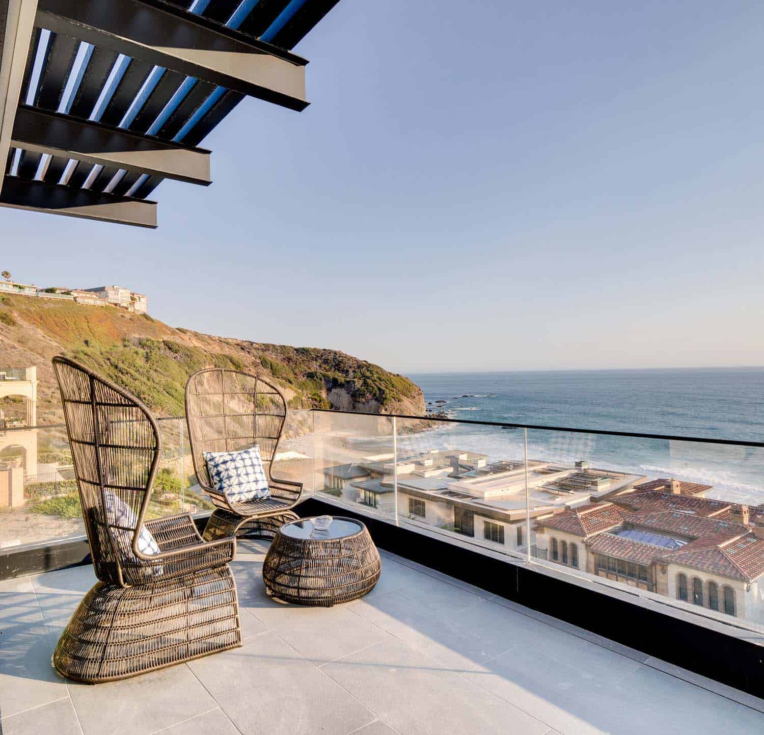 coastal contemporary patio with a swimming pool