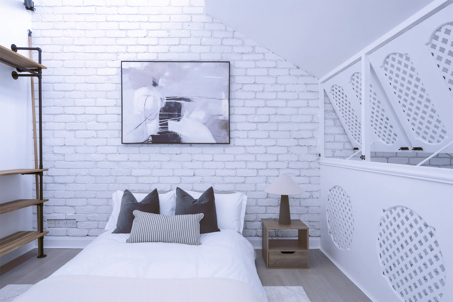 chambre loft Londres murs briques blanches